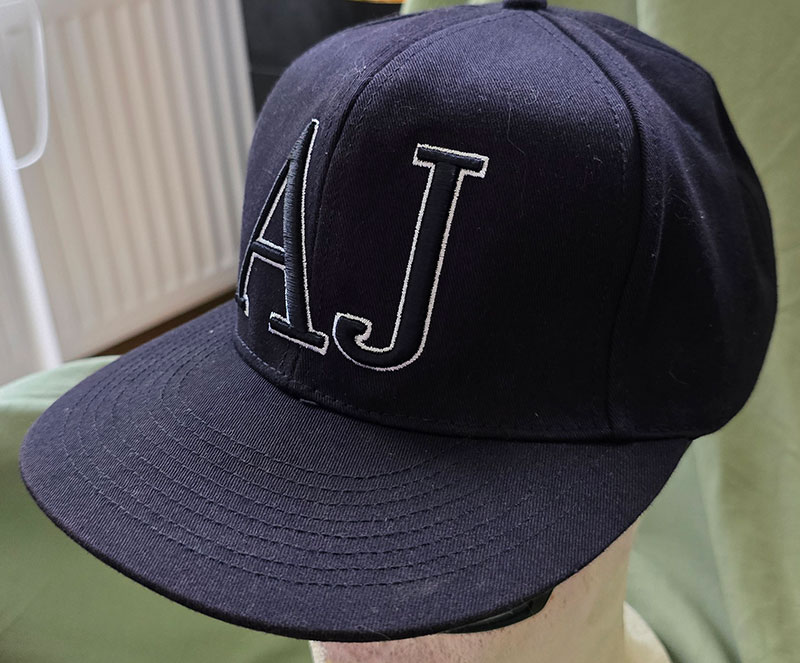 AJ  
